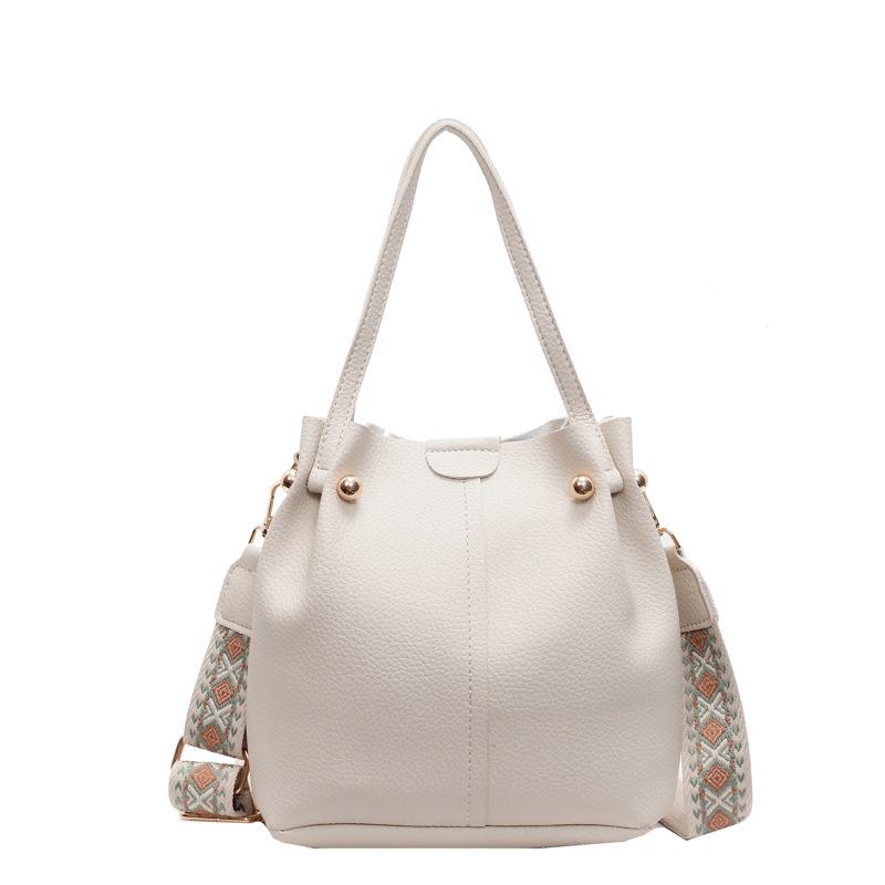 

Mini Bucket Bag for Women Soft Leather Handbag with Drawstring Closure and Decorative Metal Studs бежевый