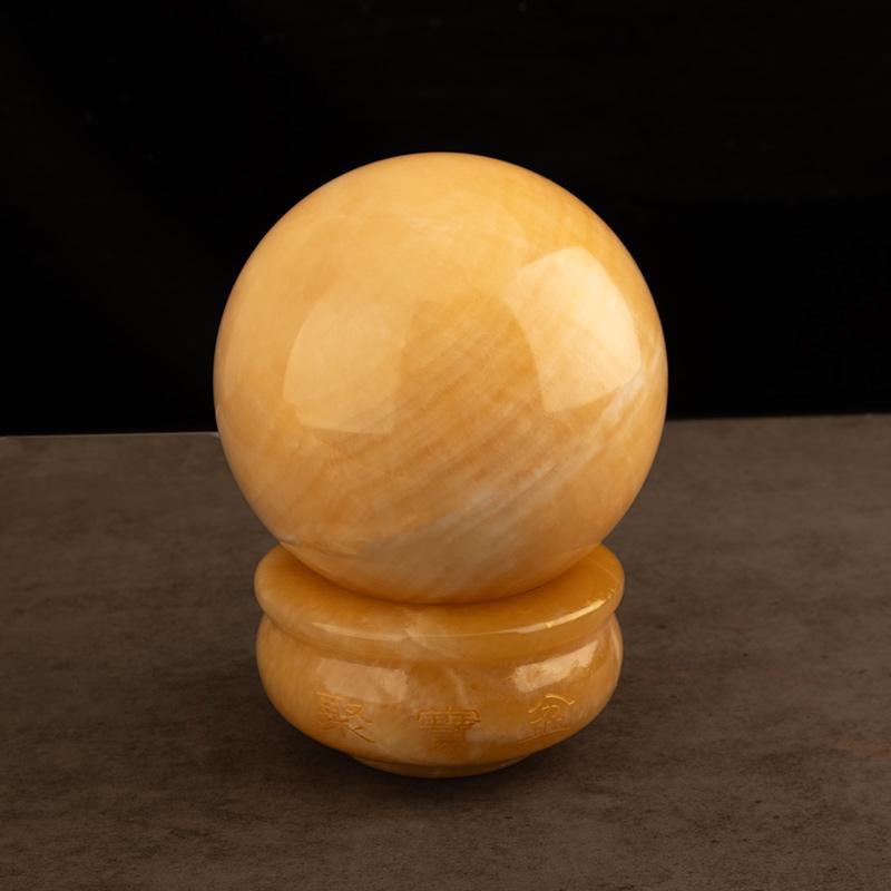 

Natural Yellow Topaz Crystal Feng Shui Ball Ornament with Treasure Pot Base for Wealth and Kitchen Enhancement 6cm Diameter + Treasure Pot Base