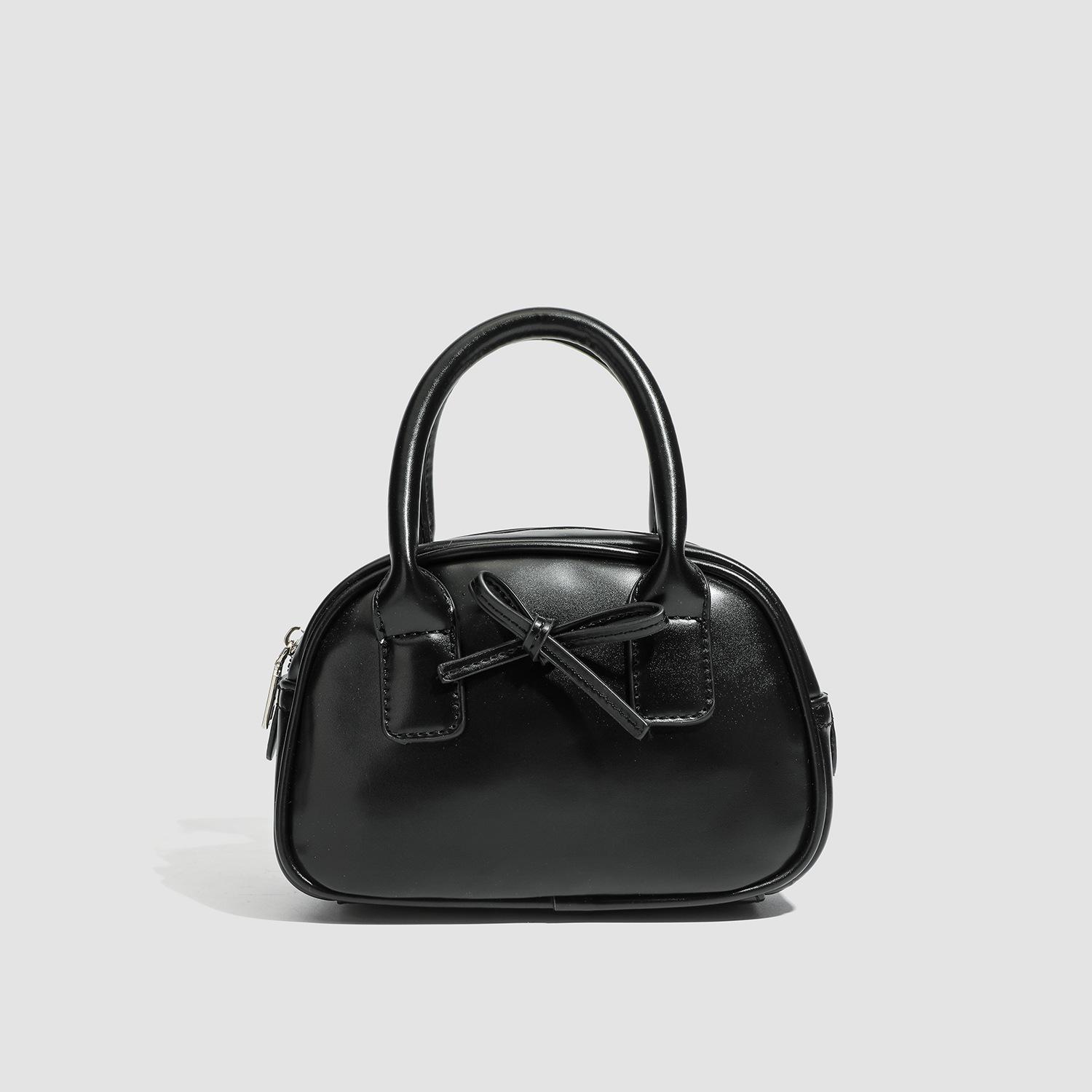 

Korean portable bow red bag women s 2025 spring new trendy fashion bowling bag versatile messenger bag