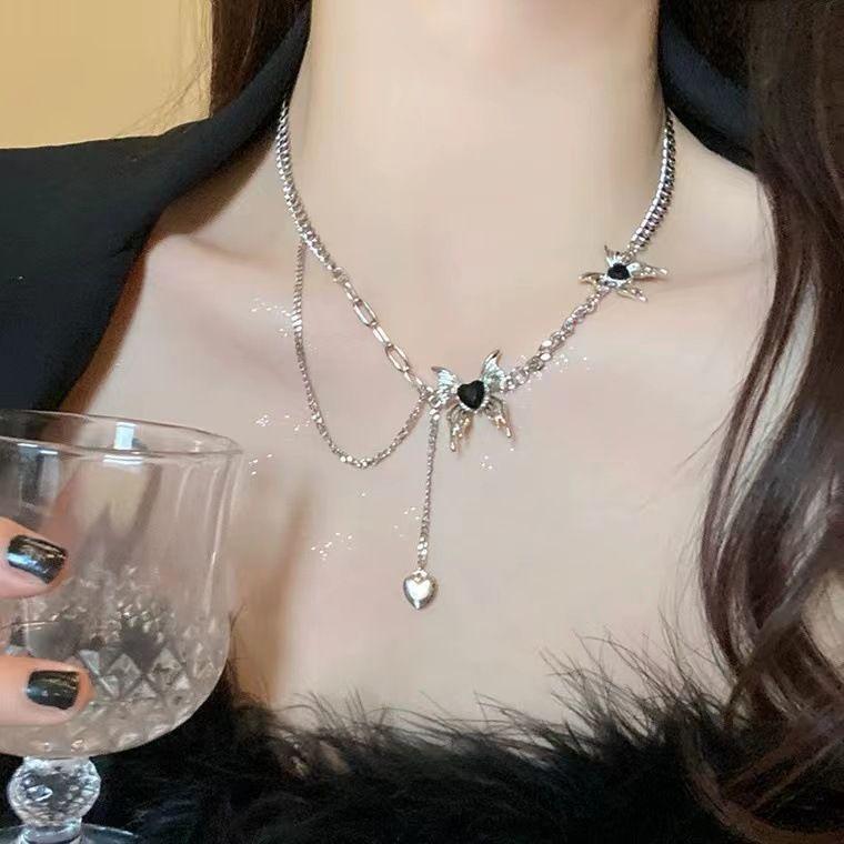 Xingxin~~ Liquid butterfly fringed necklace 2023 new high-end design light luxury niche sweater chain women's spring