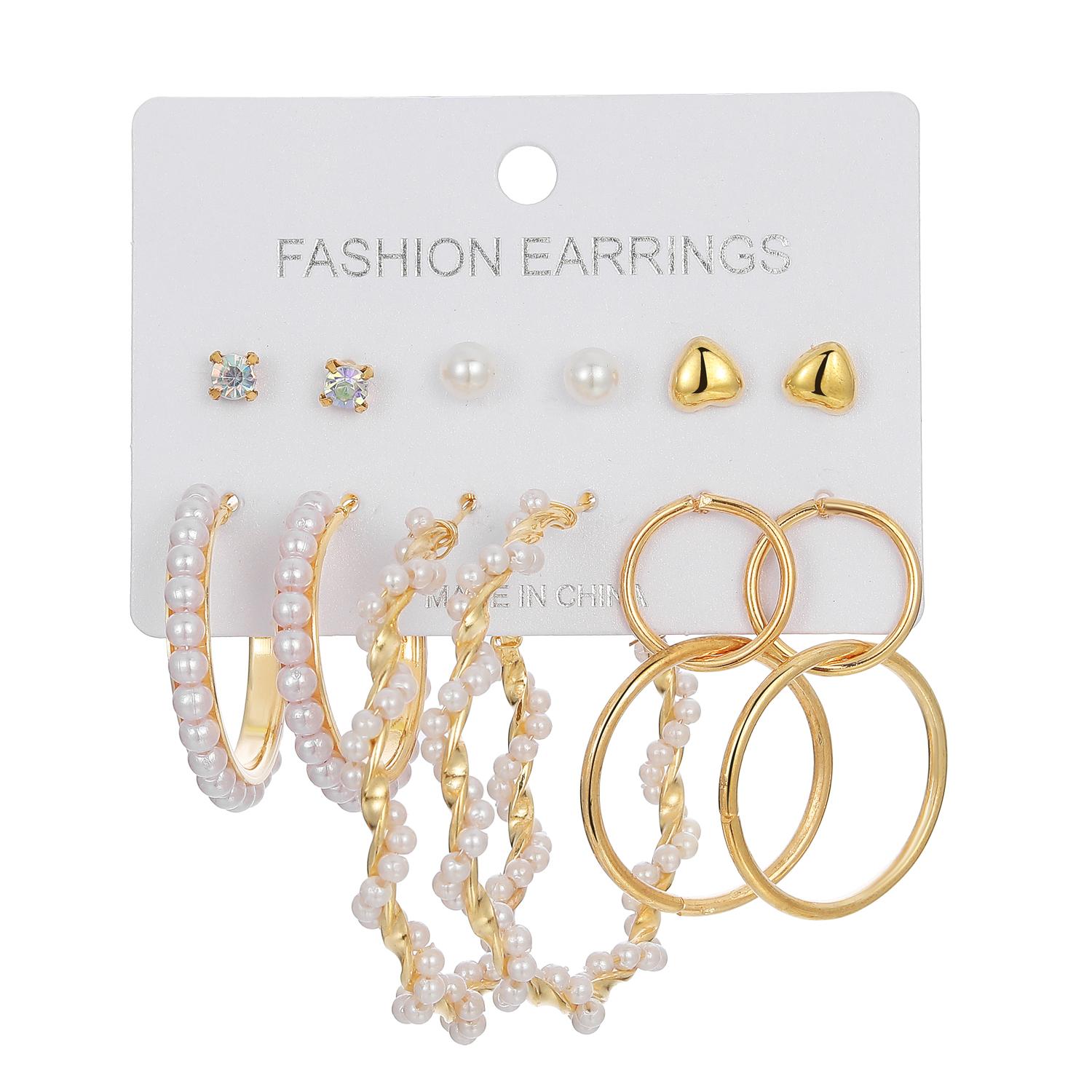 

Круглое кольцо с жемчугом. Щедрые серьги. Модные женские темпераментные круглые переплетенные очаровательные серьги. Темперамент. Роскошная личность. Сексуальный комплект сережек. золотой