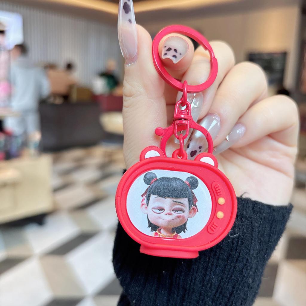 Nezha Luminous TV Keychain with Light - Student Backpack Pendant Ornament.