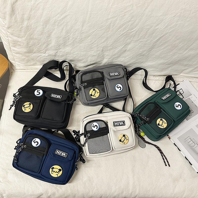 Gangfeng neutral tooling locomotive badge satchel new daily commuter mobile phone build messenger bag