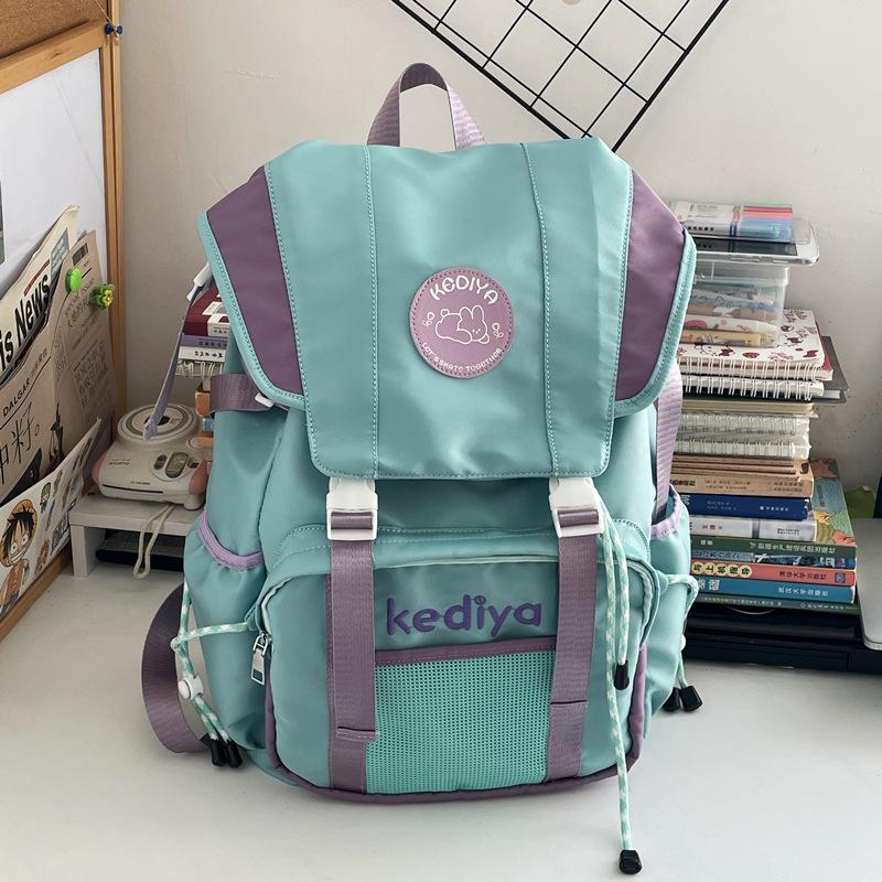 Large capacity backpack, new college student schoolbag, leisure travel nylon backpack.