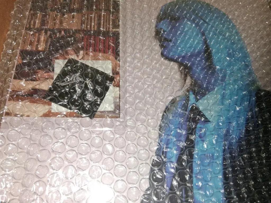Woodz Cho Seung-yeon LP, neotevřené, zapečetěné, s bonusovými předměty.