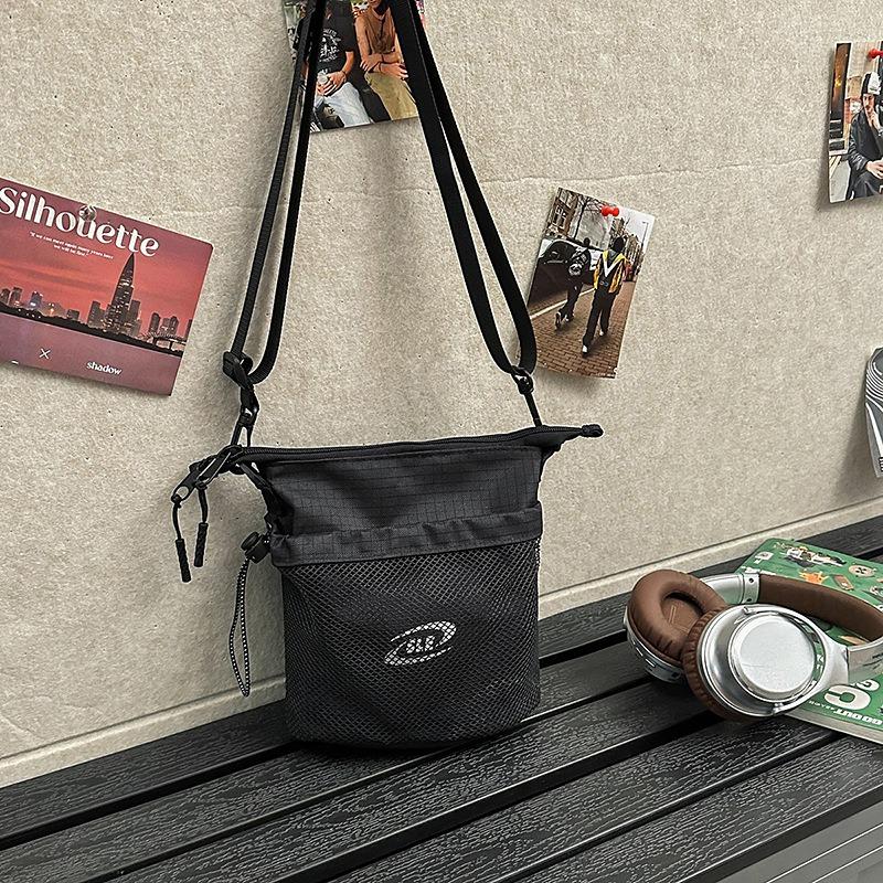 Casual messenger bag new fashion versatile commuter sports bucket shoulder bag women's mobile phone bag