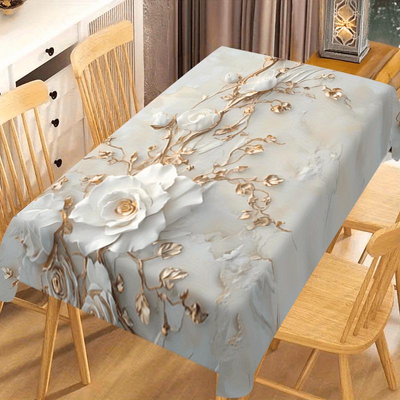 Eine elegante Tischdecke im Art-Déco-Stil – mit goldenen Zweigen und weißen floralen Mustern, geeignet für Hochzeitenzyc