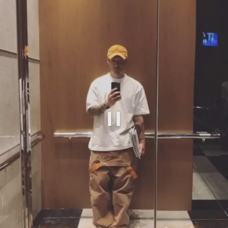 Men's Ripped Retro Denim Jumpsuit: Loose, Trending, and Versatile Casual Overalls.