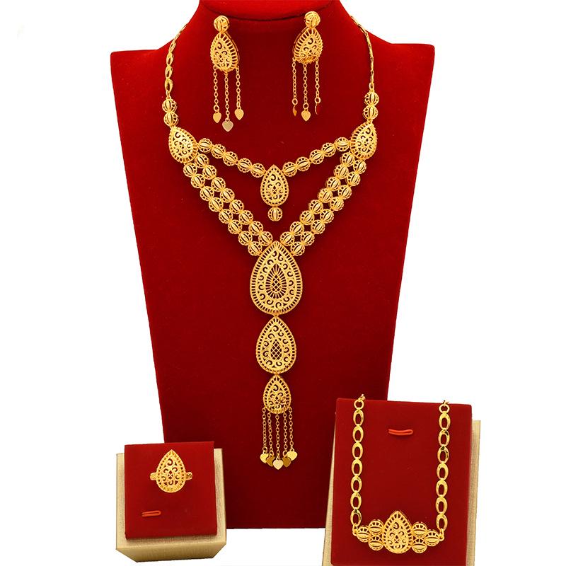 Dubai Wedding Jewelry Set: Ethnic Brass Gold-Plated Necklace, Earrings, Ring, and Bracelet.