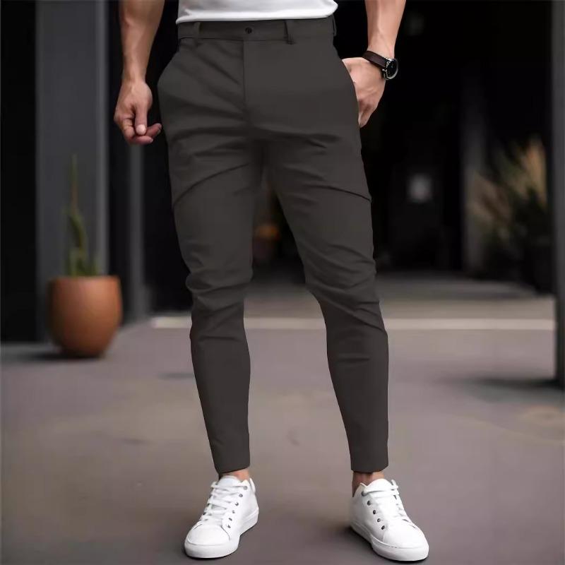 Men Solid Color Elastic Casual Tapered Long Pants