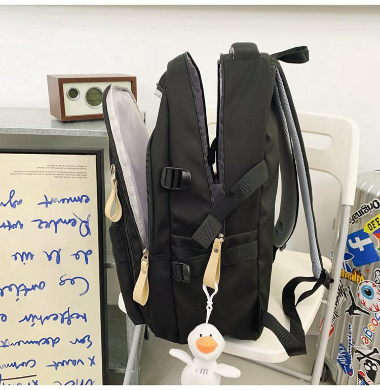 Fashionable Water-Repellent Student Backpack: Trendy High-Capacity Design for Couples