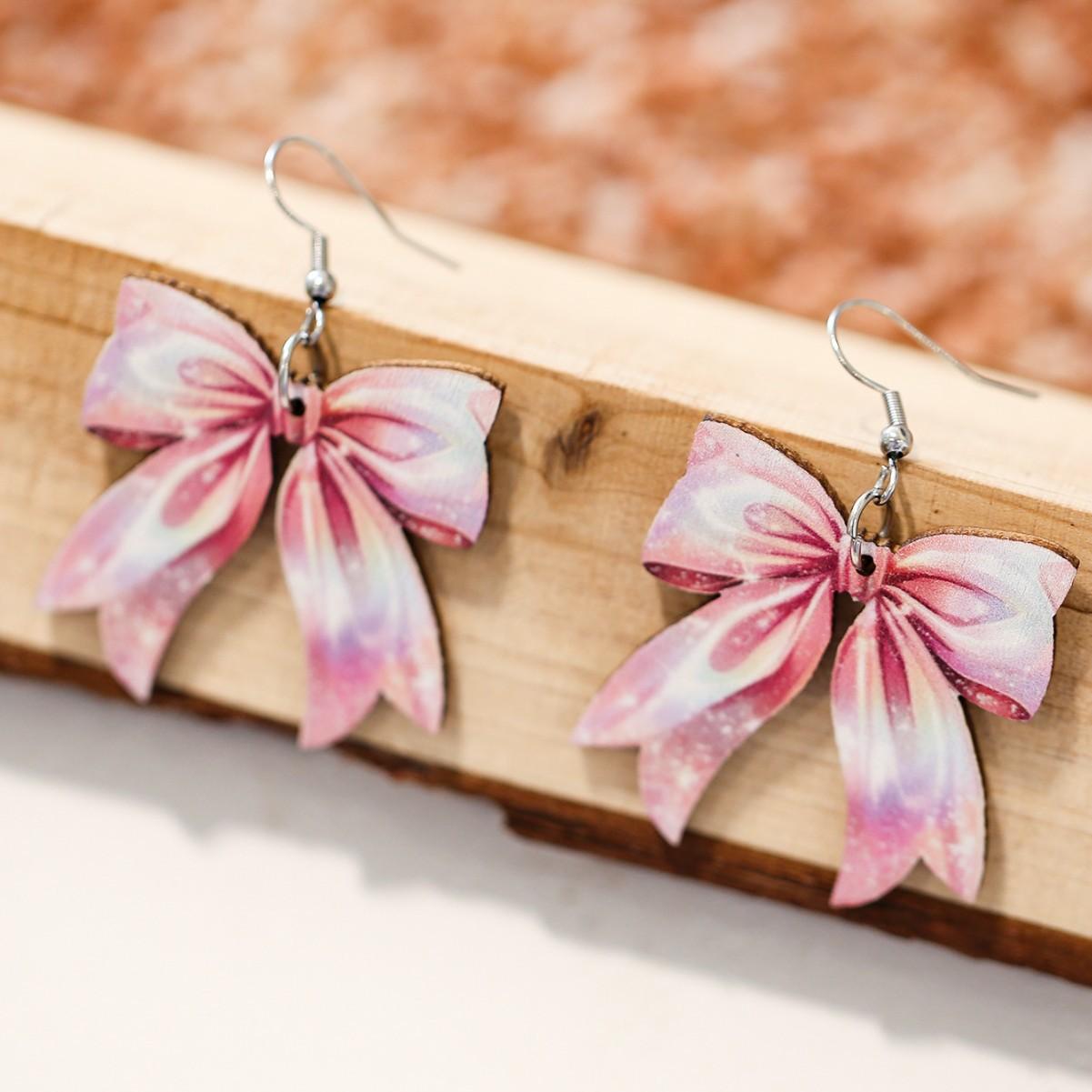 

Streamer Bow Wooden Earrings розовый