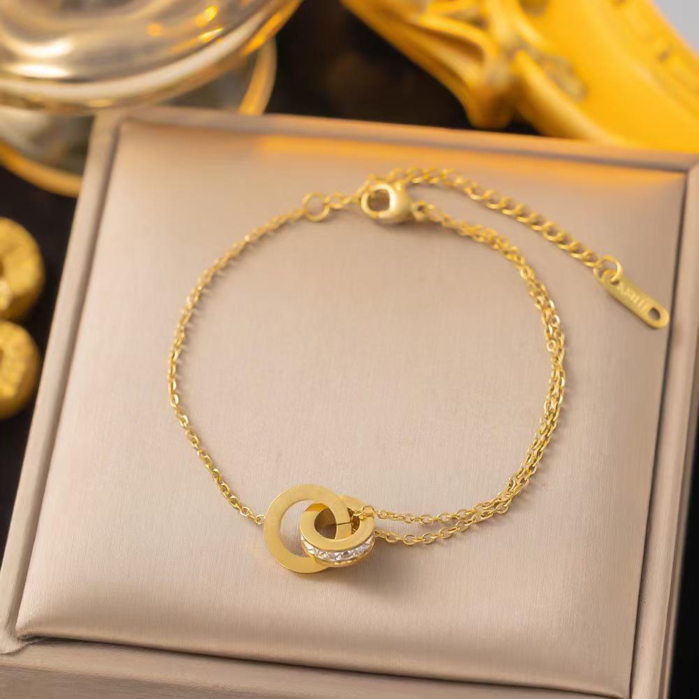 Exquisite Roman Double Ring Earrings: Chic, Versatile, High-End Titanium Steel Design for Women. Non-Fading and Timeless Elegance.