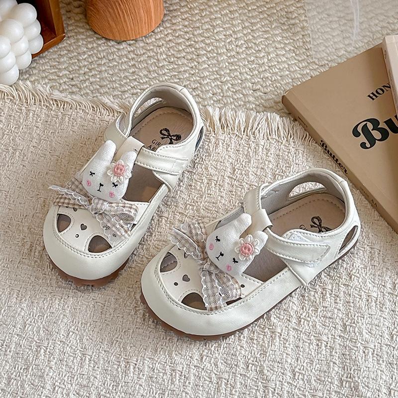 

Girls Solid Color Hollow Sandals2026Summer cute bow-tie bunny princess sandals for older children 23-28Code one hand6Double бежевый