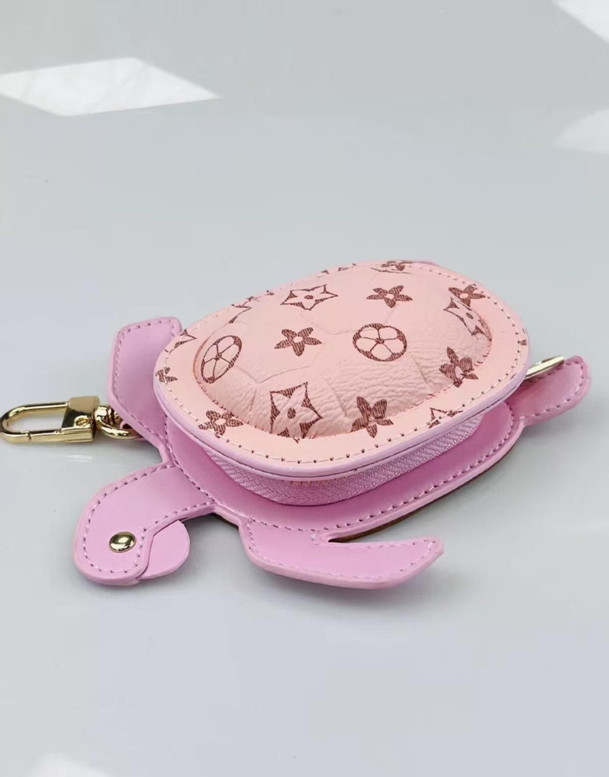 

Turtle bag accessories pendant earphone bag high-end leather car keychain creative lipstick creative storage рожевий