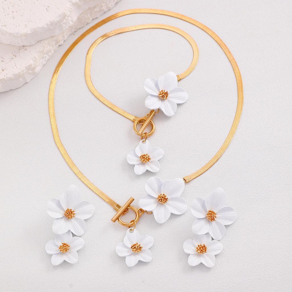 Elegant Alloy Flower Pendant Necklace and Earrings Set for Women - Fashionable, High-End, and Versatile.