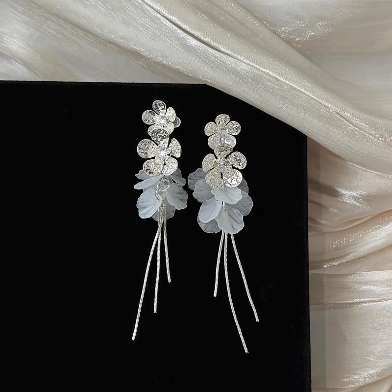 

Zircon flower shell seaside vacation wind flow Su long earrings women s round face earrings new high sense