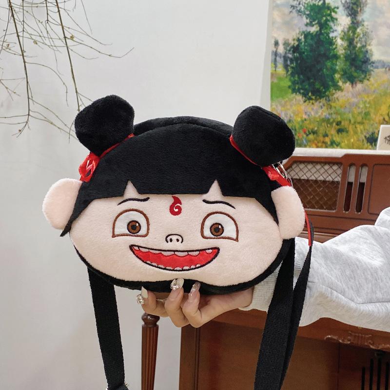 Cute Nezha Laughing And Big Eyed Expression Cartoon Embroidery Plush Backpack