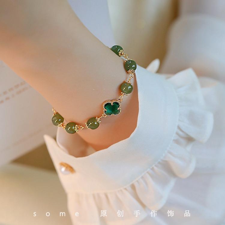 Clover*Hetian jade four-leaf clover bracelet, lucky niche design, new model that enhances complexion