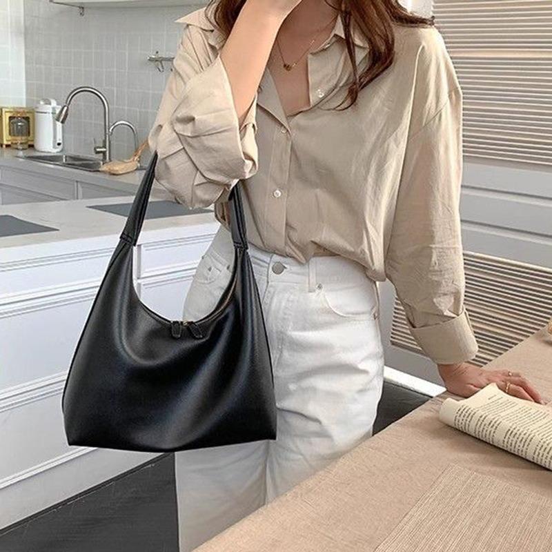 ins simple and versatile milk tea color bag gentle wind Korean portable soft leather dumpling bag retro shoulder armpit bag