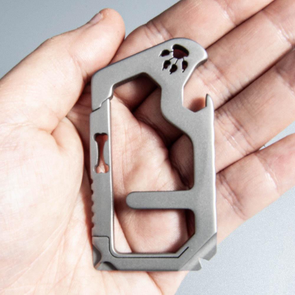 Titanium Alloy Multifunction Keychain with Bottle Opener, Screwdriver, and Pendant for Keys and Bags.