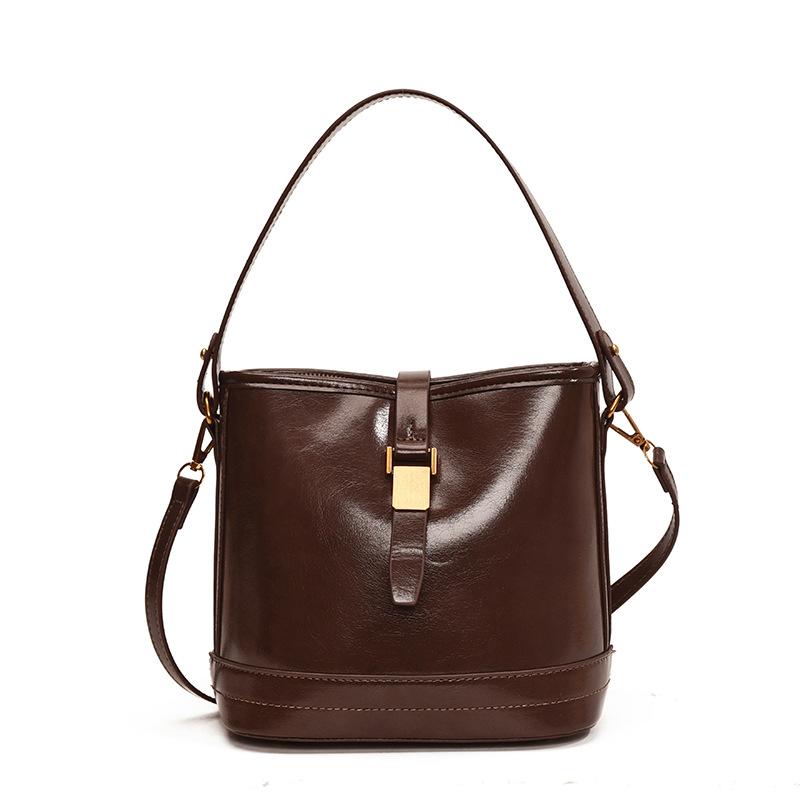 Commuter to work Hand carry bucket bag 2025 niche trendy messenger bag women's winter new fashion casual shoulder bag