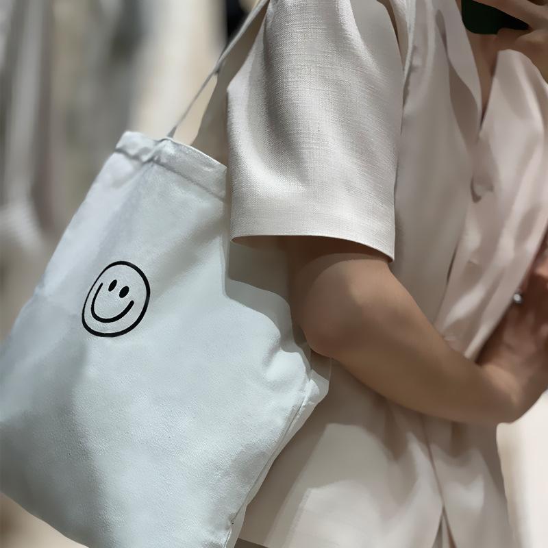 Канвас сумка новая большая смайлик простой стиль большая вместимость портативная повседневного использования студенческая классная канвас сумка 3336CM 1740₽