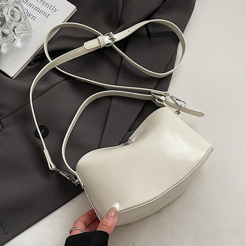 This Year's Super Fire, Simple and Fashionable Korean Handbag, Women's High-end Oil Wax Leather Fashion Versatile Commuter Messenger Bag