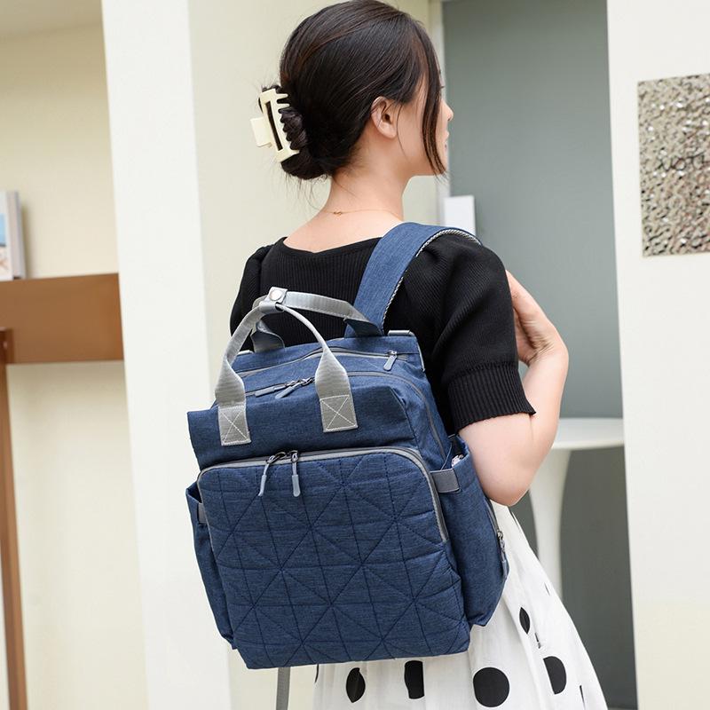 Doppelschulter-Großraum-Einfarbig-Multifunktionale Mama-Tasche mit isolierter Aufbewahrung für Milchflaschen.