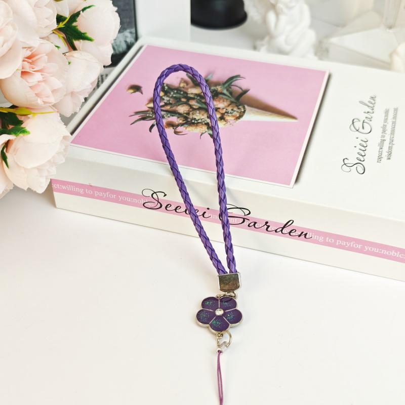 Creative Camellia Clover Lucky Phone Lanyard: Four-Leaf Clover Flower Woven PU Phone Chain Pendant.