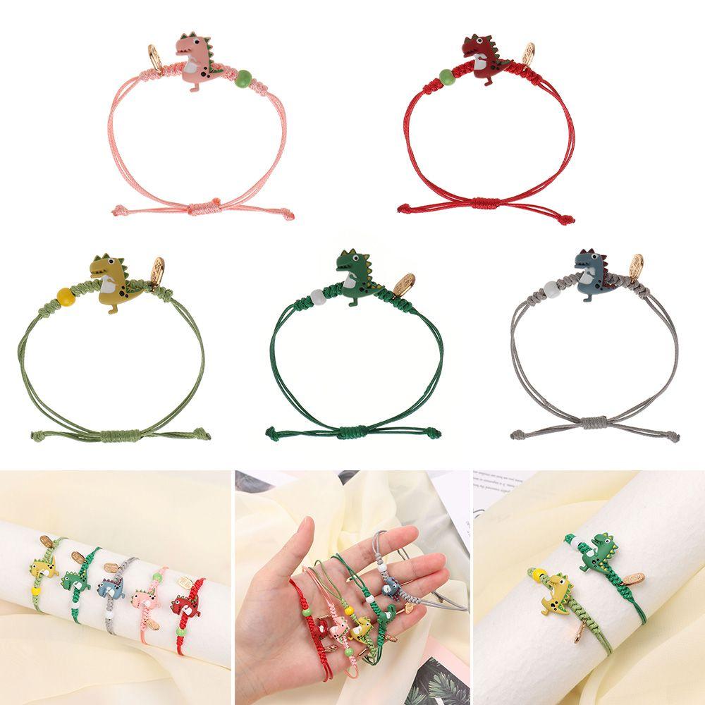 

Ручной работы динозавр плетеный ручной веревки бусины цепочка мультфильм динозавр браслет браслет-подвеска