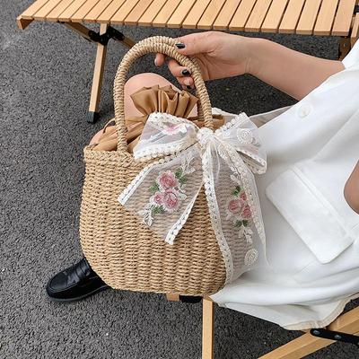 Letná nová čipkovaná slamená kabelka Dámska veľkokapacitná ratanová plážová taška Cestovná taška na dovolenku Ručne vyrábaná kabelka Bucket Bag Tote