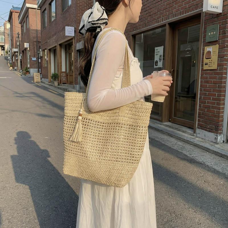 Woven Straw Tote with Tassel Accent and Spacious Interior for Summer Beach or Casual Daily Use