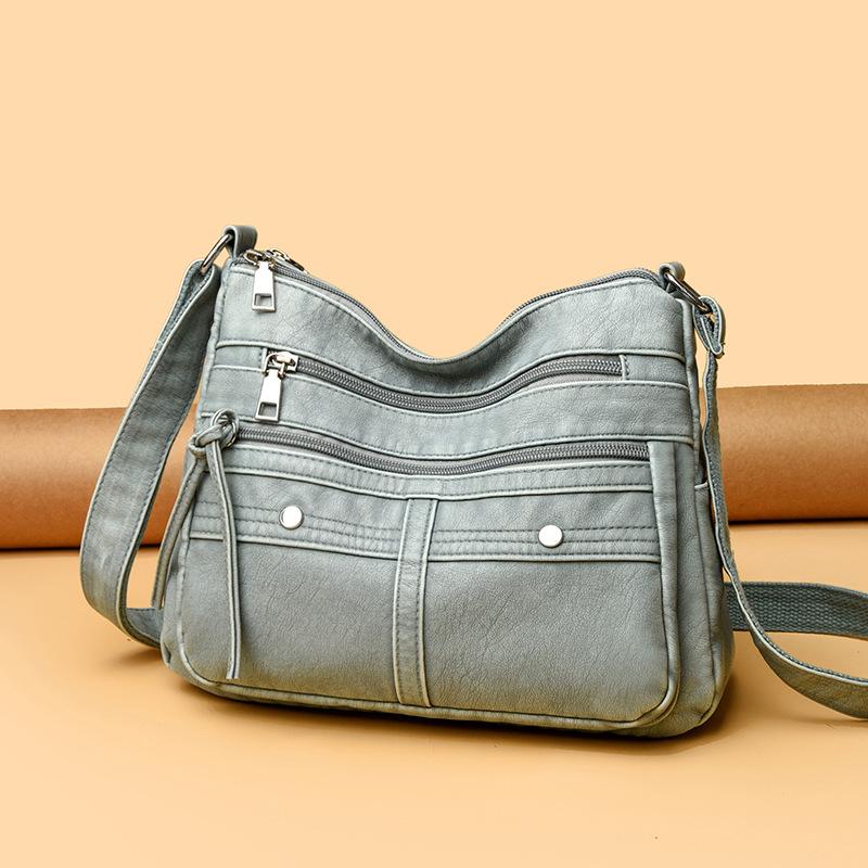 Fashion trend shoulder bag popular new multi-layer messenger bag splicing large-capacity commuter women's bag