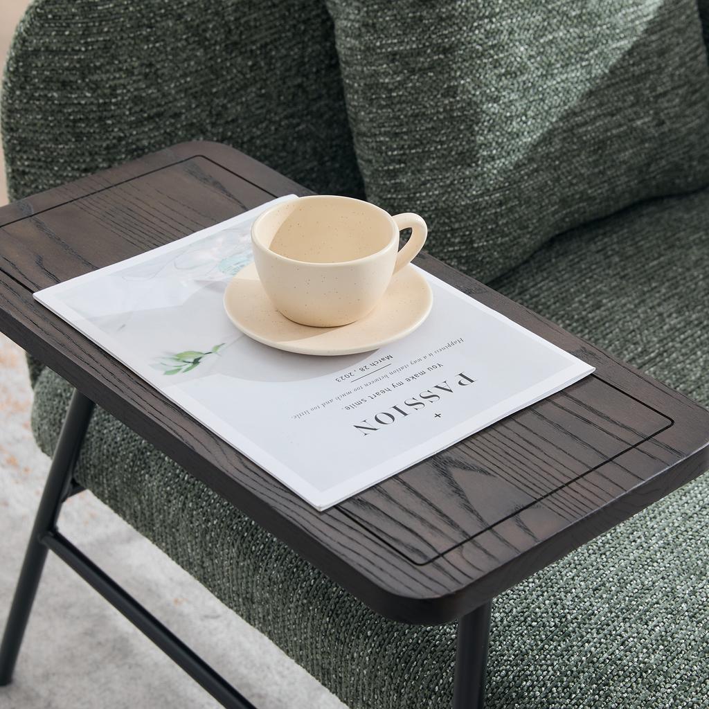 Modern single armchair with comfortable fabric backrest and two storage compartments, complemented by a practical side table.