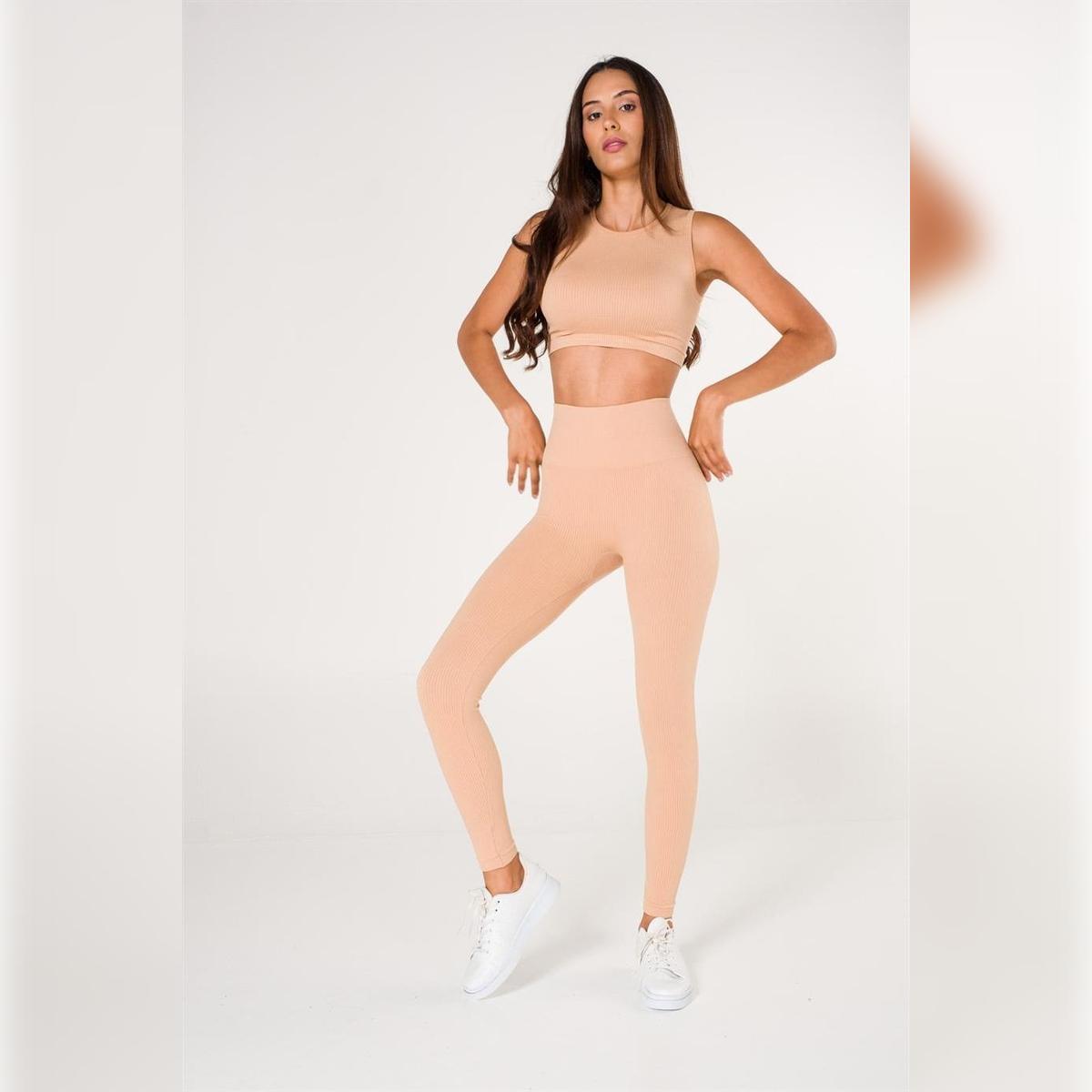 

Ребристі безшовні скульптурні легінси XS/S світло-коричневого кольору