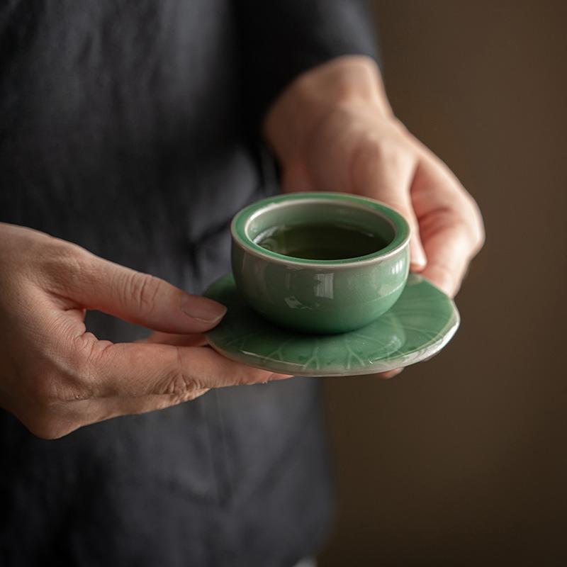 Celadon shadow carving coaster, Chinese antique kung fu tea set, handmade tea holder, ceramic lotus leaf coaster