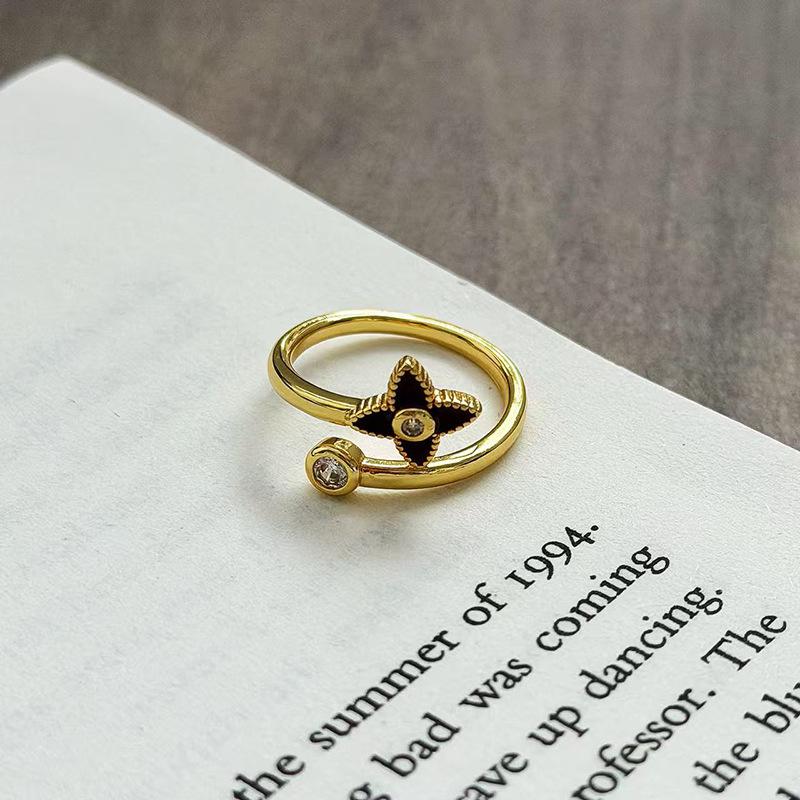 

Angola Red Enamel Transshipment Immediately Rich Flower Opening Ring Niche Retro Four-Leaf Clover Medieval Index Finger Ring Woman