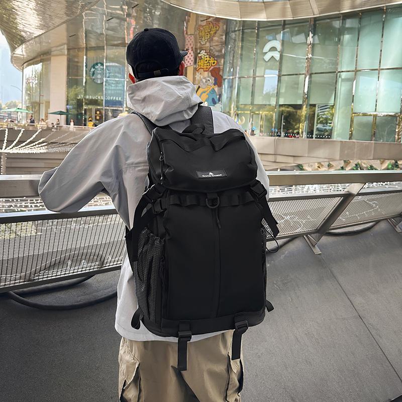 Large capacity travel bag tide brand solid color backpack sports tooling mountaineering bag male college student high school student schoolbag