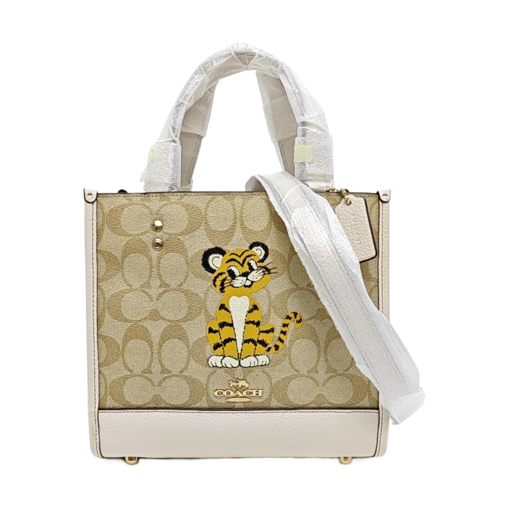 [Pre-Owned] Dempsey 22 Classic Monogram Tiger Print Coated Canvas And Leather Tote Bag - Excellent #16QSKUC ONE SIZE