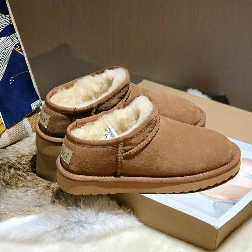 Fashion snow boots, genuine women's boots, broken size withdrawal processing, winter sheepskin and fur integrated flat-bottomed warm short cotton boot