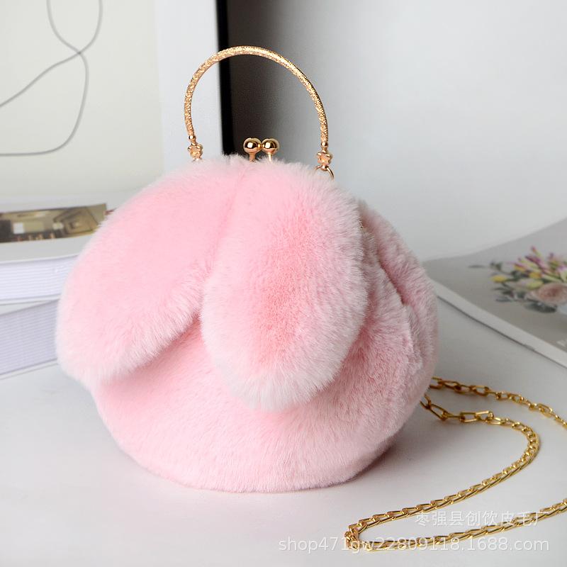 Plush rabbit bag female oblique cross Korean version cute portable fluffy bag autumn and winter new rabbit ear clip bag clip bag