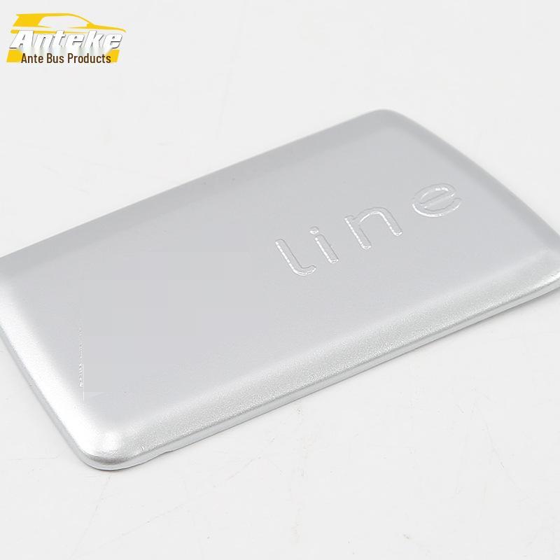 18 Q5L Decorative Center Console Panel: Electroplated Headlight Switch Cover for Lower Left Console.