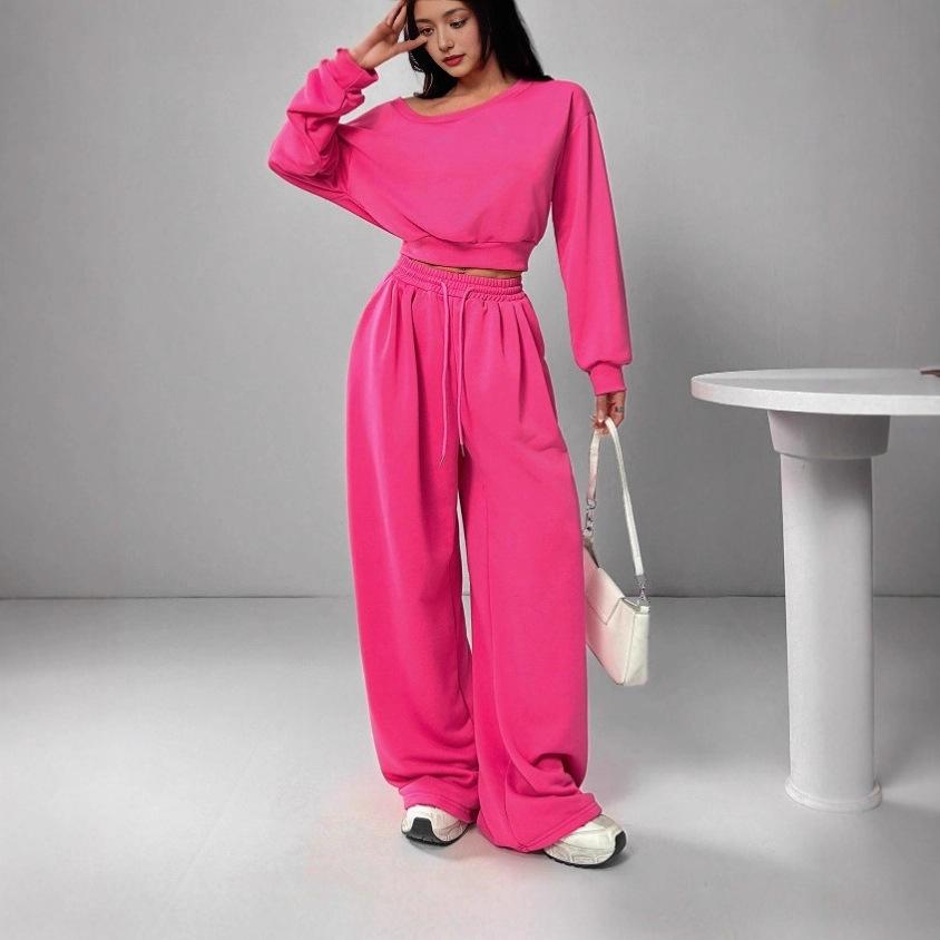 [Spot] 2025 new product explosion European and American casual suit solid color sweater women's one-word collar off the shoulder loose knitting