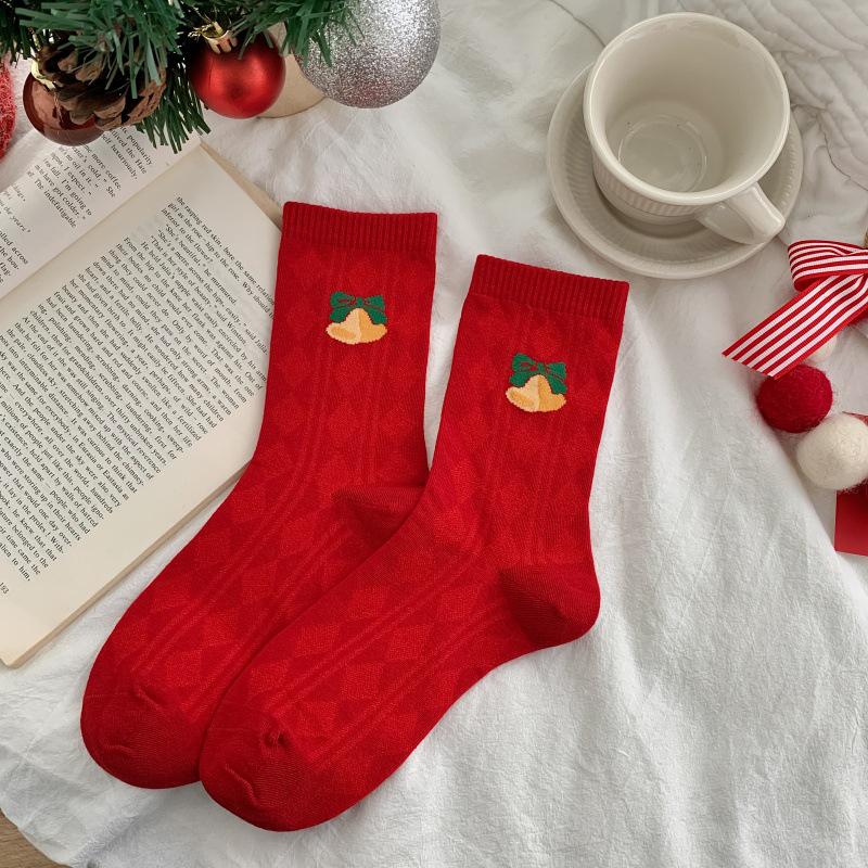 25 år Røde julestrømper: Gaveeske med herre- og damevintermidleggsokker - Trendy pargave