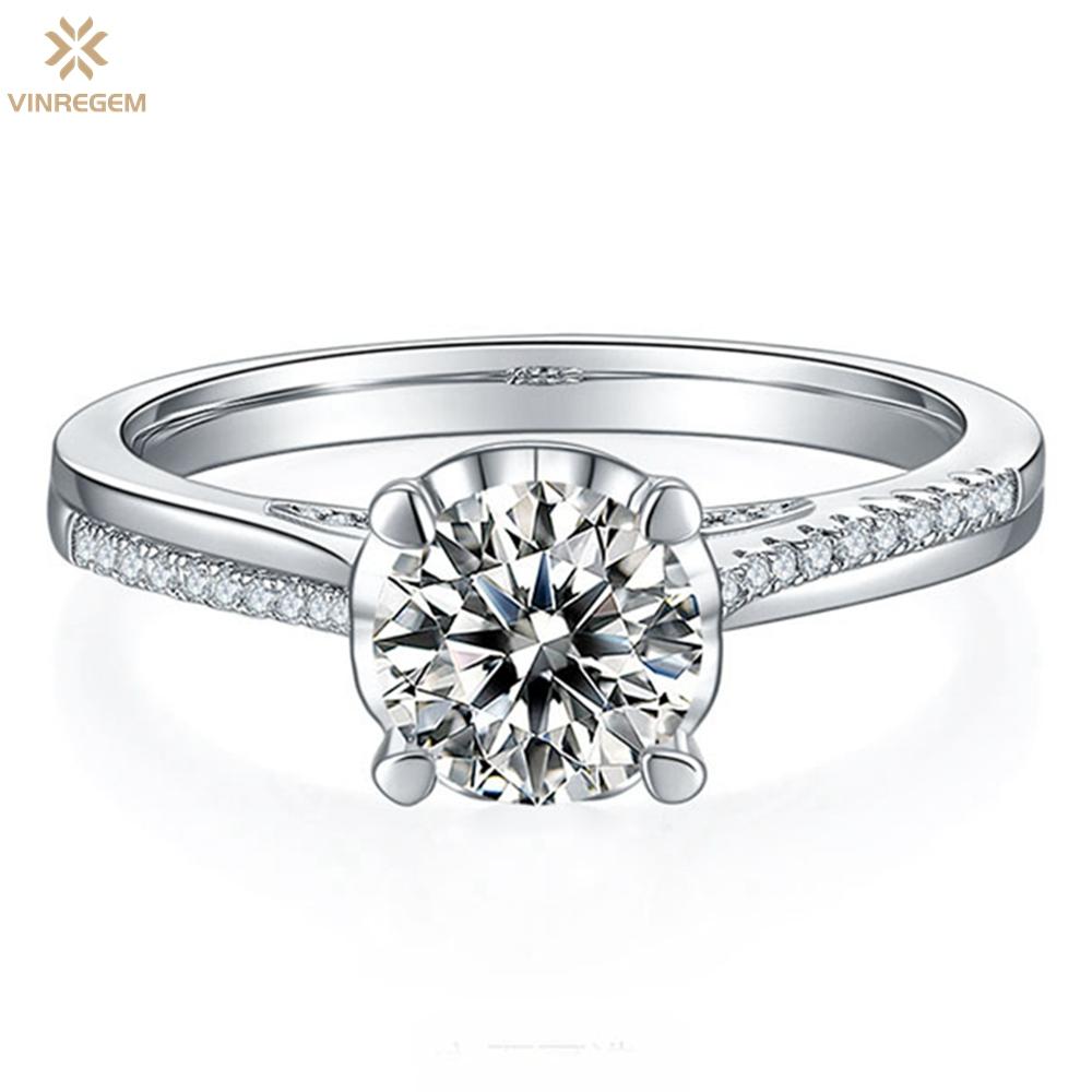 

Vinregem 100% 925 стерлингового серебра VVS1 1CT D Цвет Настоящий муассанит Бриллиант Помолвка Тонкие ювелирные изделия Женщины Кольцо Юбилейный подарок