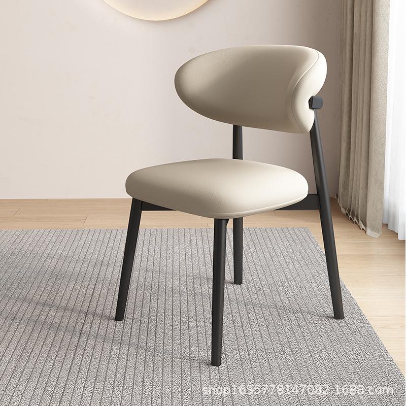 Nordic Modern Minimalist Solid Wood Dining Chair with Soft Pack Backrest - Comfortable Light Luxury Ram's Horn Design for Home, Restaurant, and Hotel.