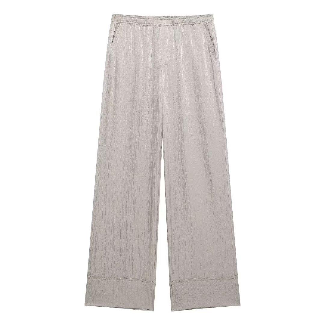 

Женский комплект из свободной блузки с завязками и брюк прямого кроя Small