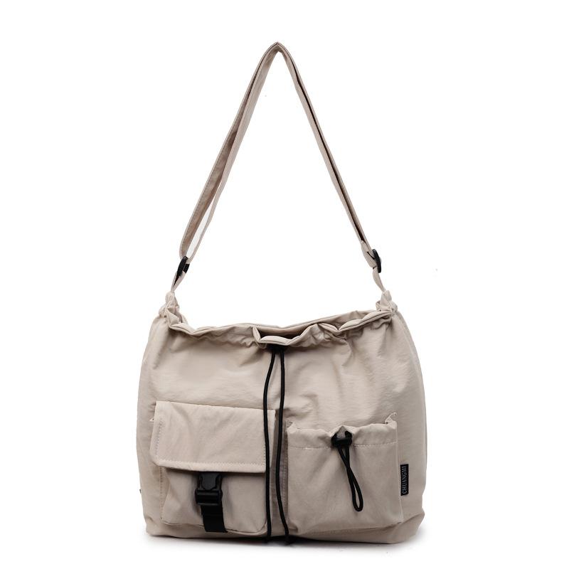 Large capacity waterproof nylon cloth drawstring shoulder bag 2025 new travel leisure fashion tote bag