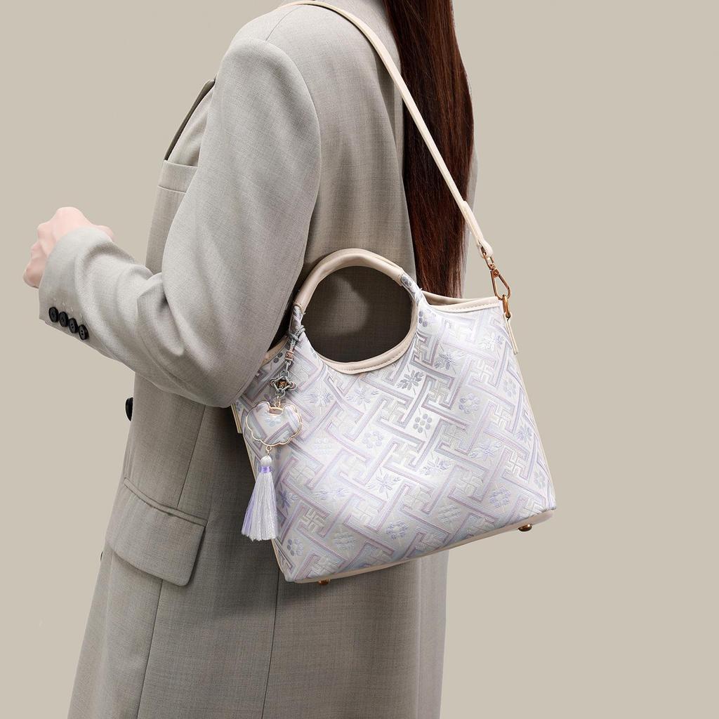2026 Guangxi Zhuang Brocade Women's Heritage Bag: Versatile Handheld, Shoulder, and Crossbody